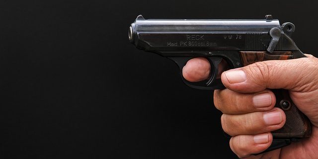 A man was charged with Prohibited Use of a Weapon for possessing firearms while drunk after he shot a test shot into the air.